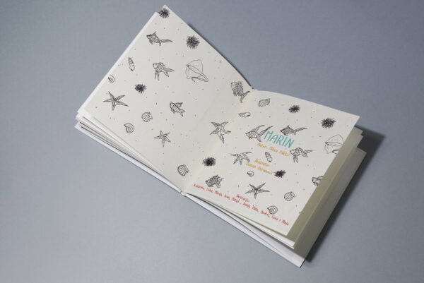 Mid fold book mockup with floral illustration